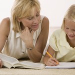 Mother Helping Daughter with Homework